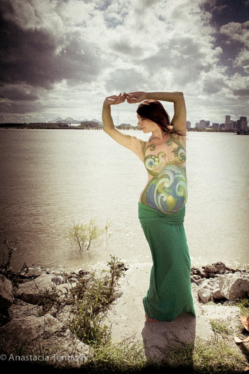 Cynthia during pregnancy by the river in New Orleans